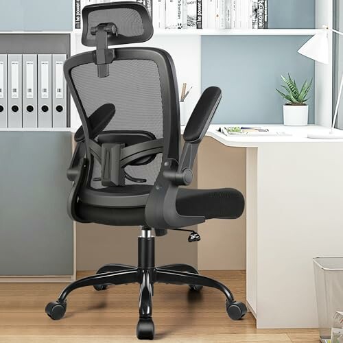Ergonomic office chair at a desk with shelves.