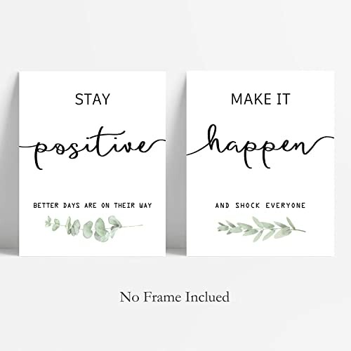 Two motivational quote art prints with plant illustrations.